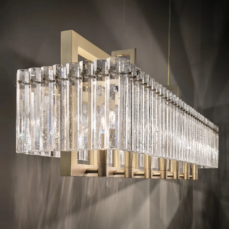 Chandeliers with Venetian Glass for a Luxurious LookModern Gold Chandelier With Glass Panels Inspired By Rock Crystal.
