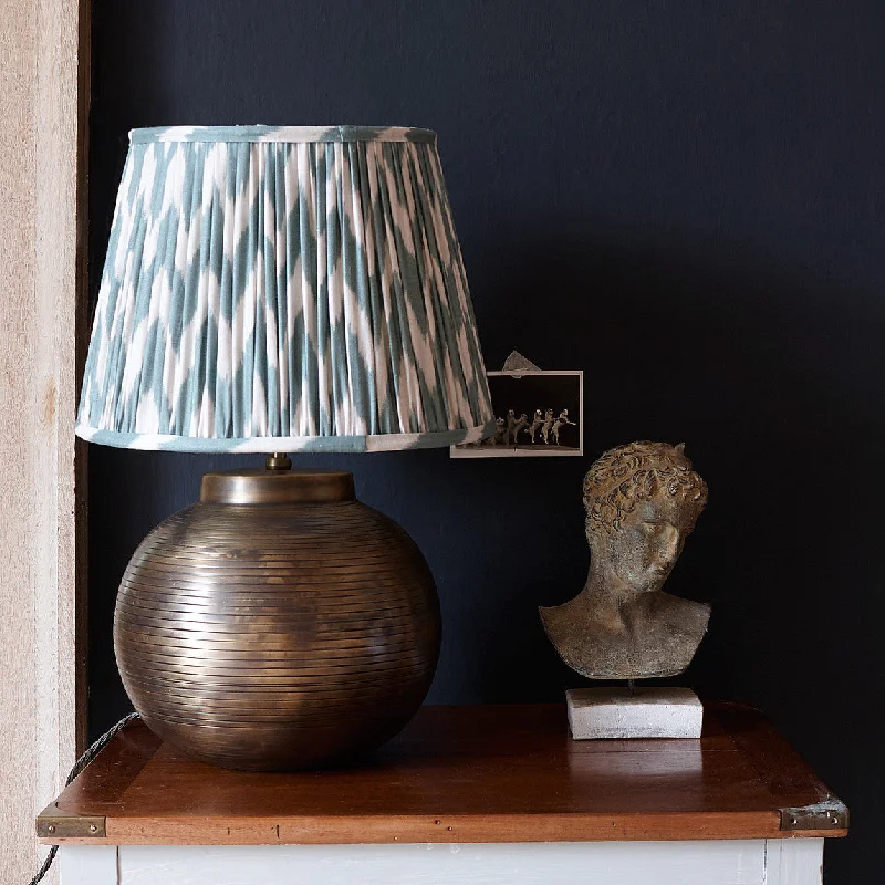 wooden table lamps with natural grain for a warm and organic feelAladdin table lamp in vintage brass