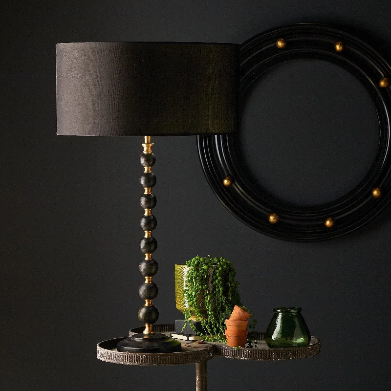 fabric table lamps with a linen shade for a relaxed and breathable lookLarger Rosie table lamp in wood and brass