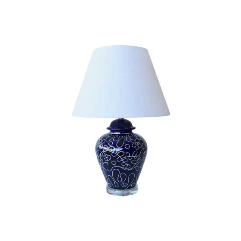 wooden table lamps with natural grain for a warm and organic feelNavy & black lamp crystal base off white shade