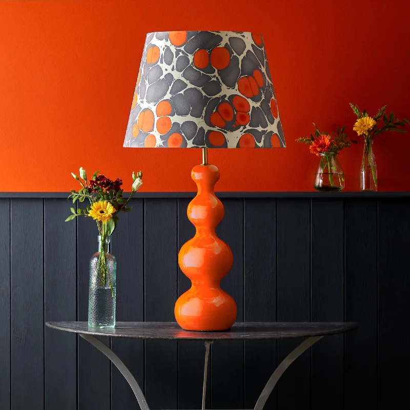 ceramic table lamps with hand painted designs for an artistic touchSmaller Wobster table lamp in orange lacquered wood