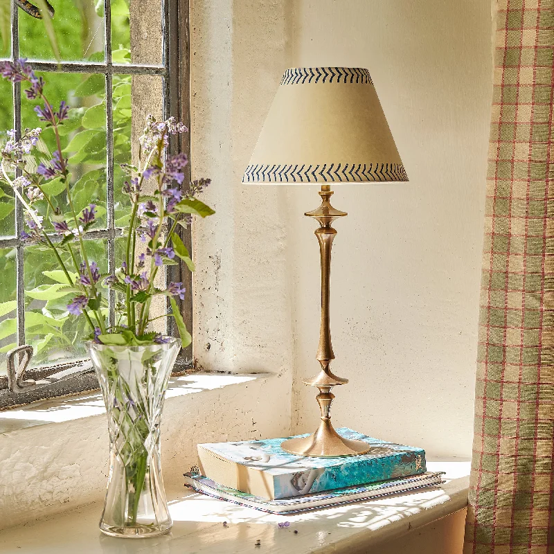 mid century modern table lamps with iconic designs for a stylish studySpindle rechargeable table lamp in aged brass
